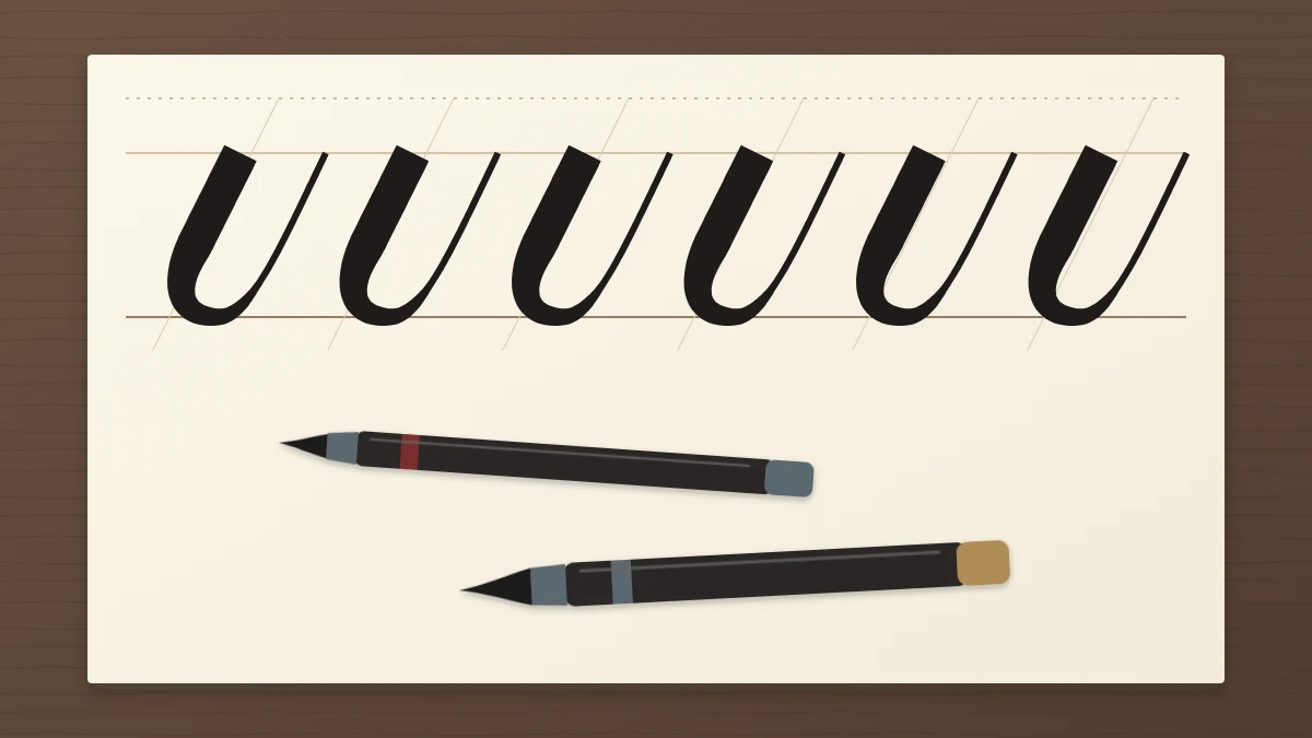 A small-tip and a large-tip brush pen lying on ivory paper beside a row of thick-and-thin underturn strokes