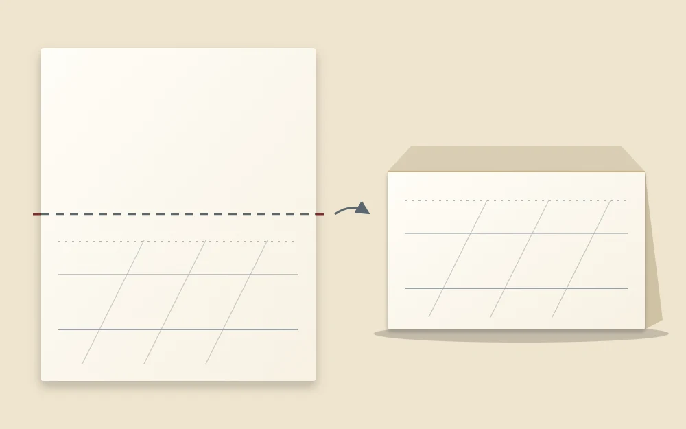 A flat card with a dashed fold line and pencil guidelines on its lower half, beside the same card folded as a tent